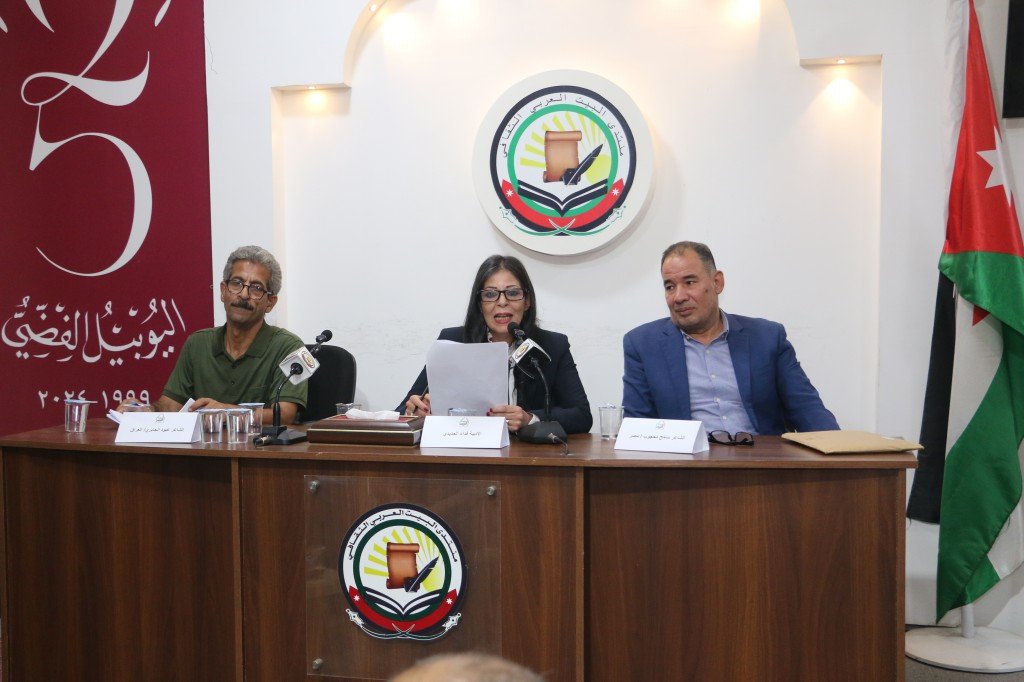 WhatsApp Image 2026-08-04 at 111737 AM Panel of three people seated at a press conference table with microphones, nameplates, and papers, emblem backdrop and Jordan flag visible on the right.