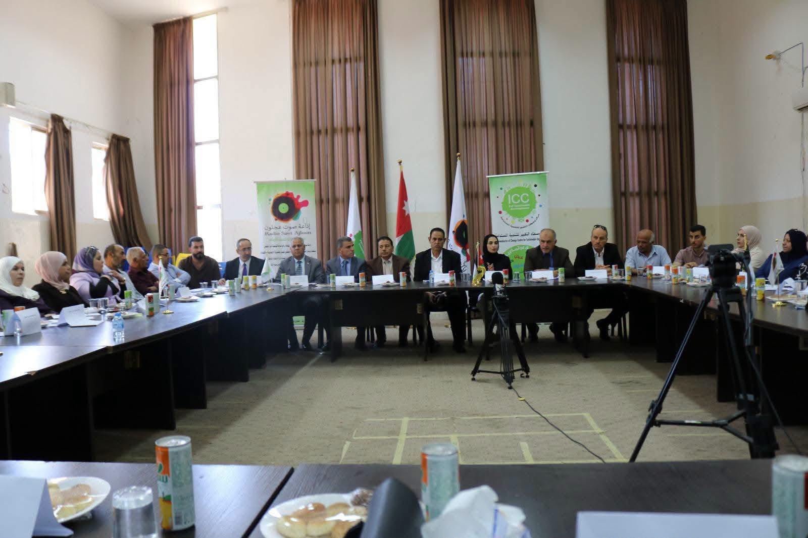 WhatsApp Image 2026-08-16 at 115830 PM - عروبة الاخباري | Oroba News Group of people seated around long conference tables in a large room, with flags and banners in the background during a formal meeting.
